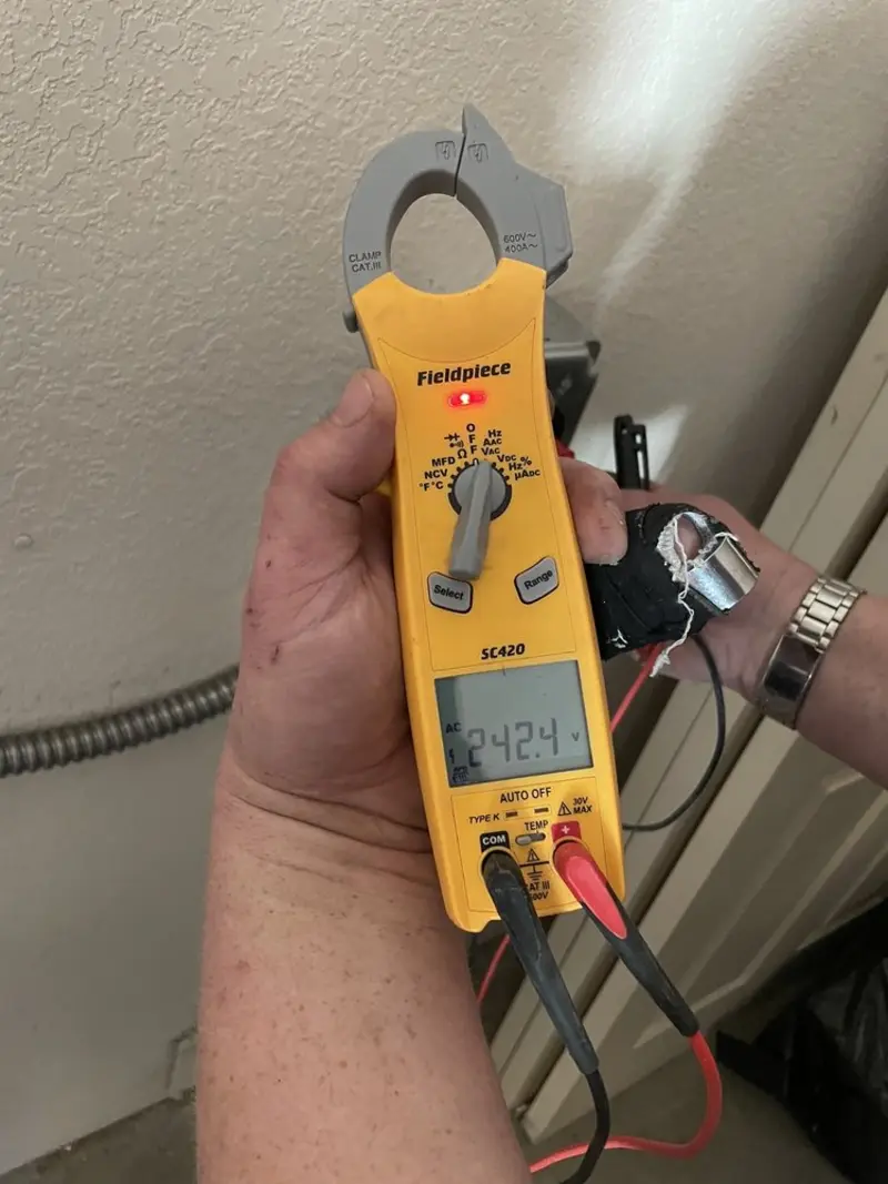Voltage testing with clamp meter during Whole House Surge Protector in Mechanicsville